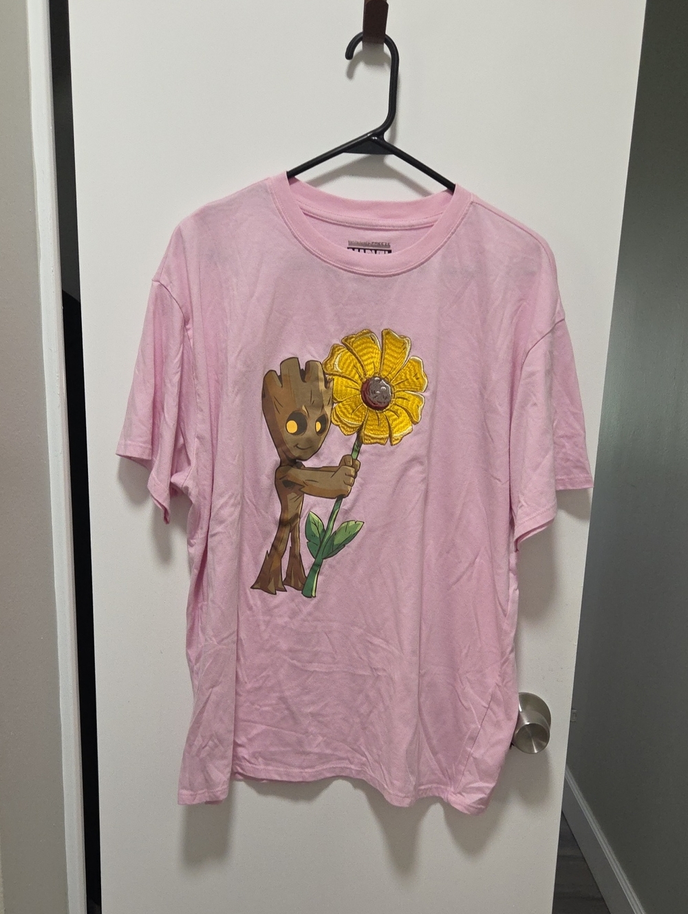 Marvel Pink Groot Holding Yellow Sunflower Graphic Tee